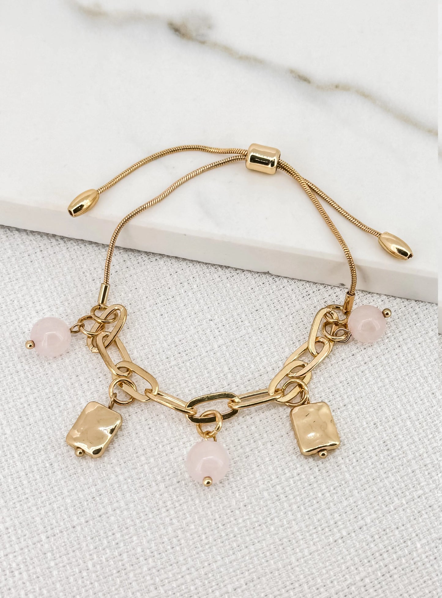 Envy Adjustable Gold Charm Bracelet with Pink Faceted Glass Beads