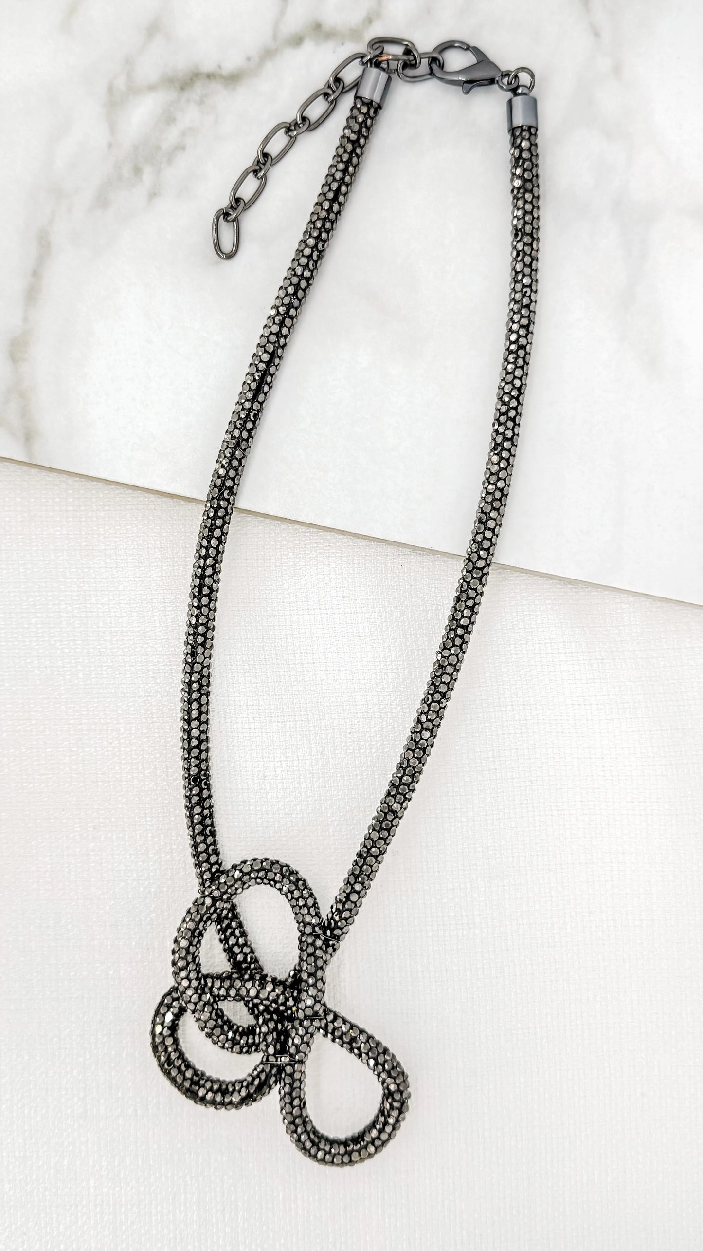 Envy Short Black Diamante Knot Necklace