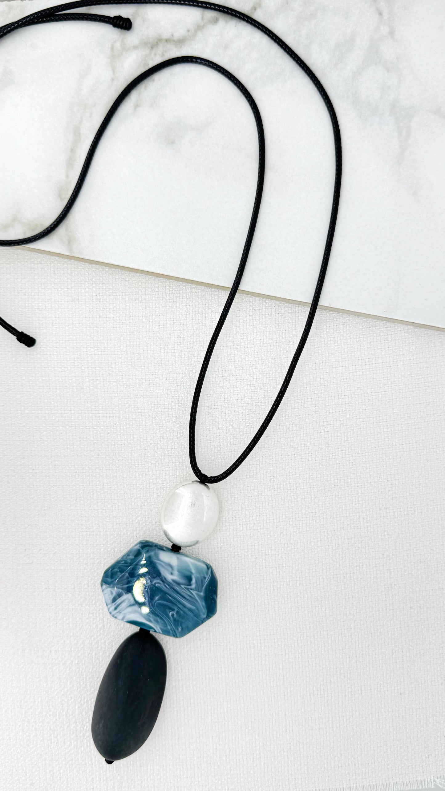 Envy Long Adjustable Black Cord Necklace with Silver, Blue & Black Resin Pendant