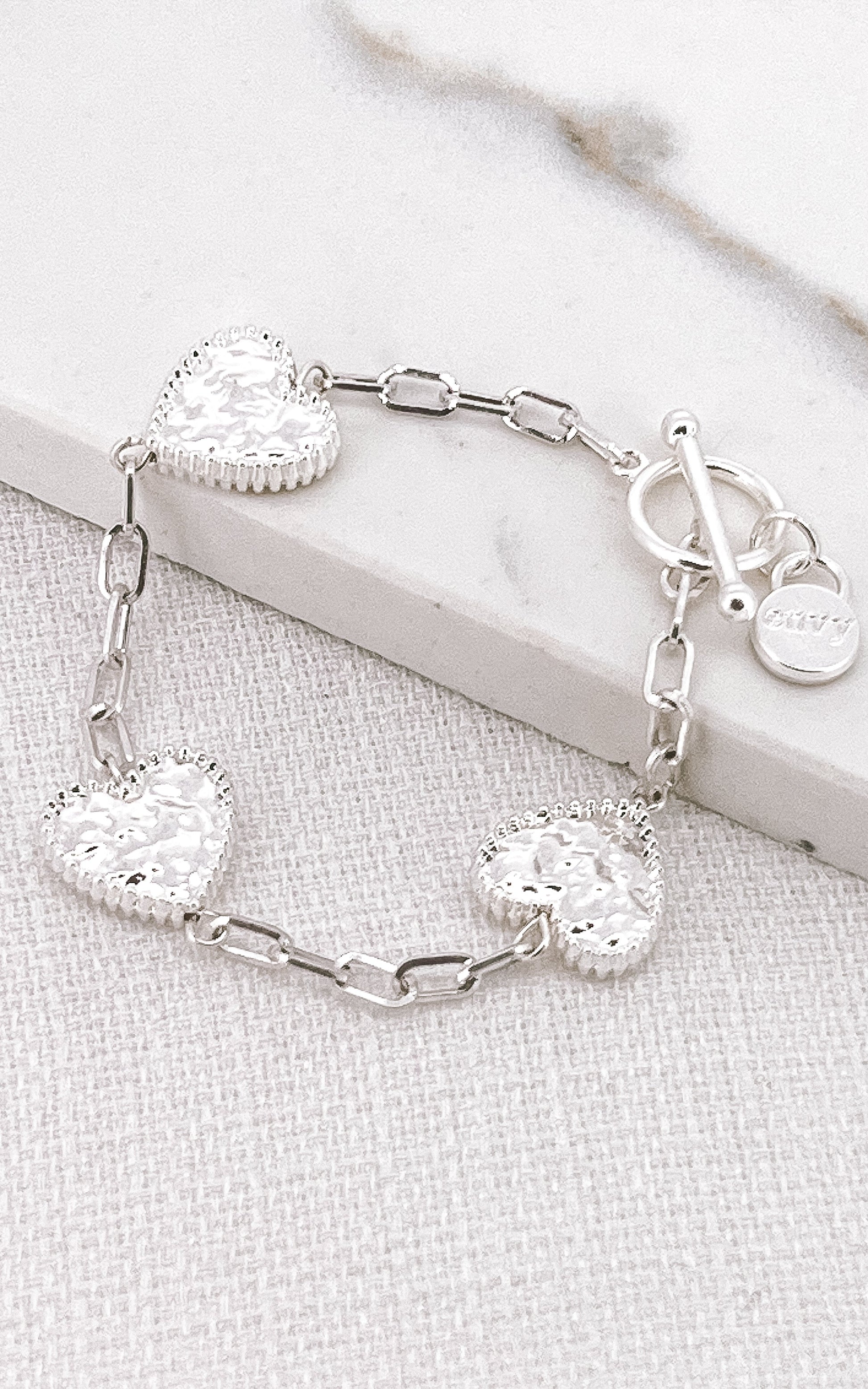Envy Silver T-bar Bracelet with Hammered Hearts
