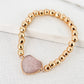 Envy Gold Alloy Bead Stretch Bracelet with Pink Semi Precious Stone Heart