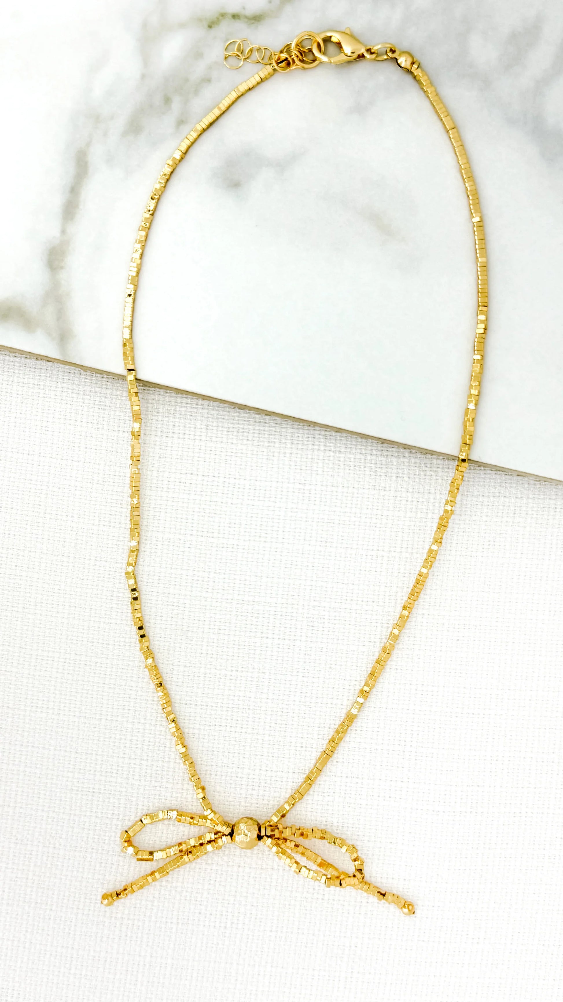 Envy Short Gold Bow Necklace