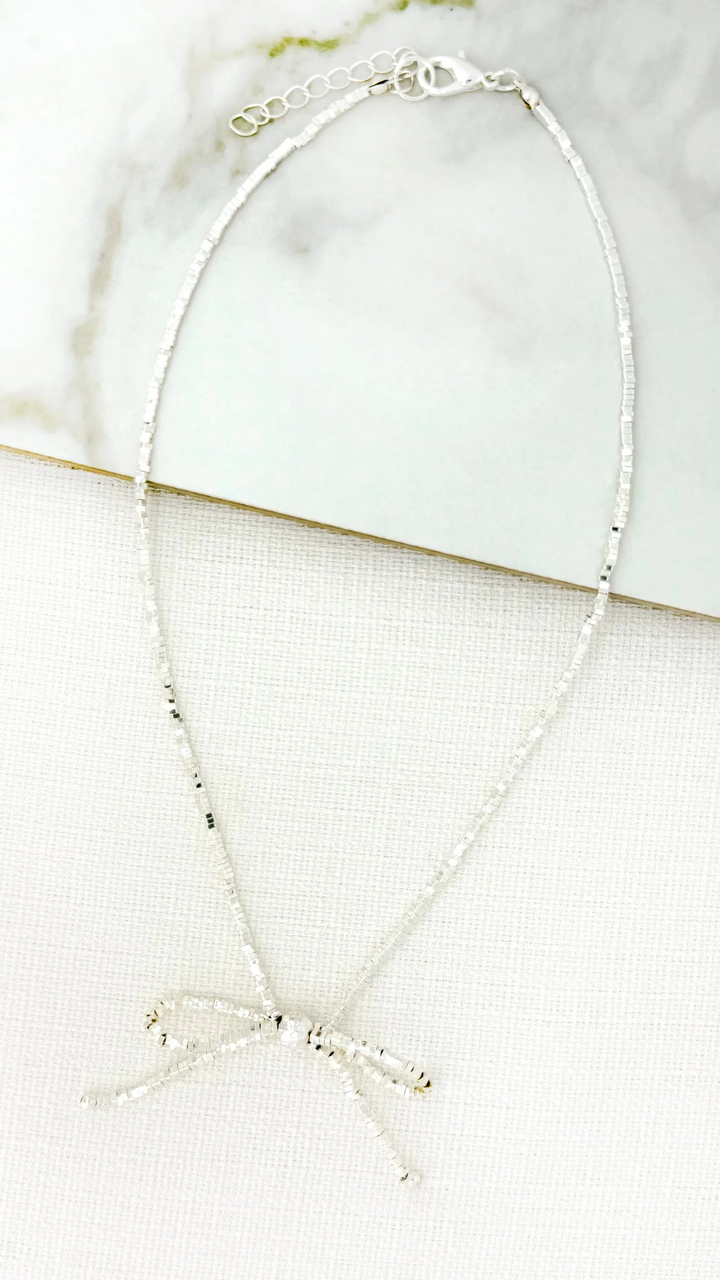 Envy Short Silver Bow Necklace