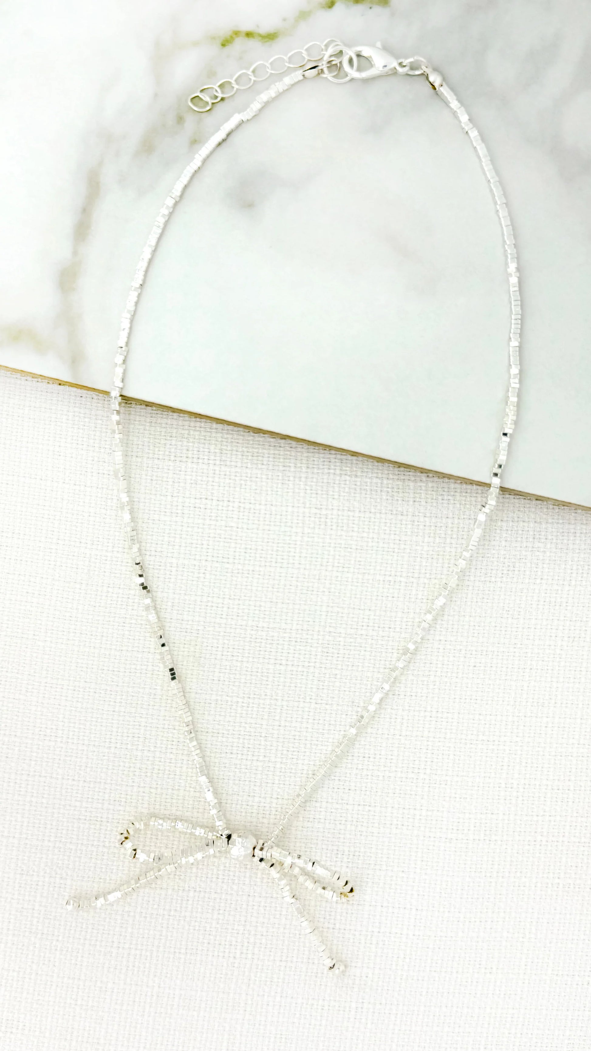 Envy Short Silver Bow Necklace