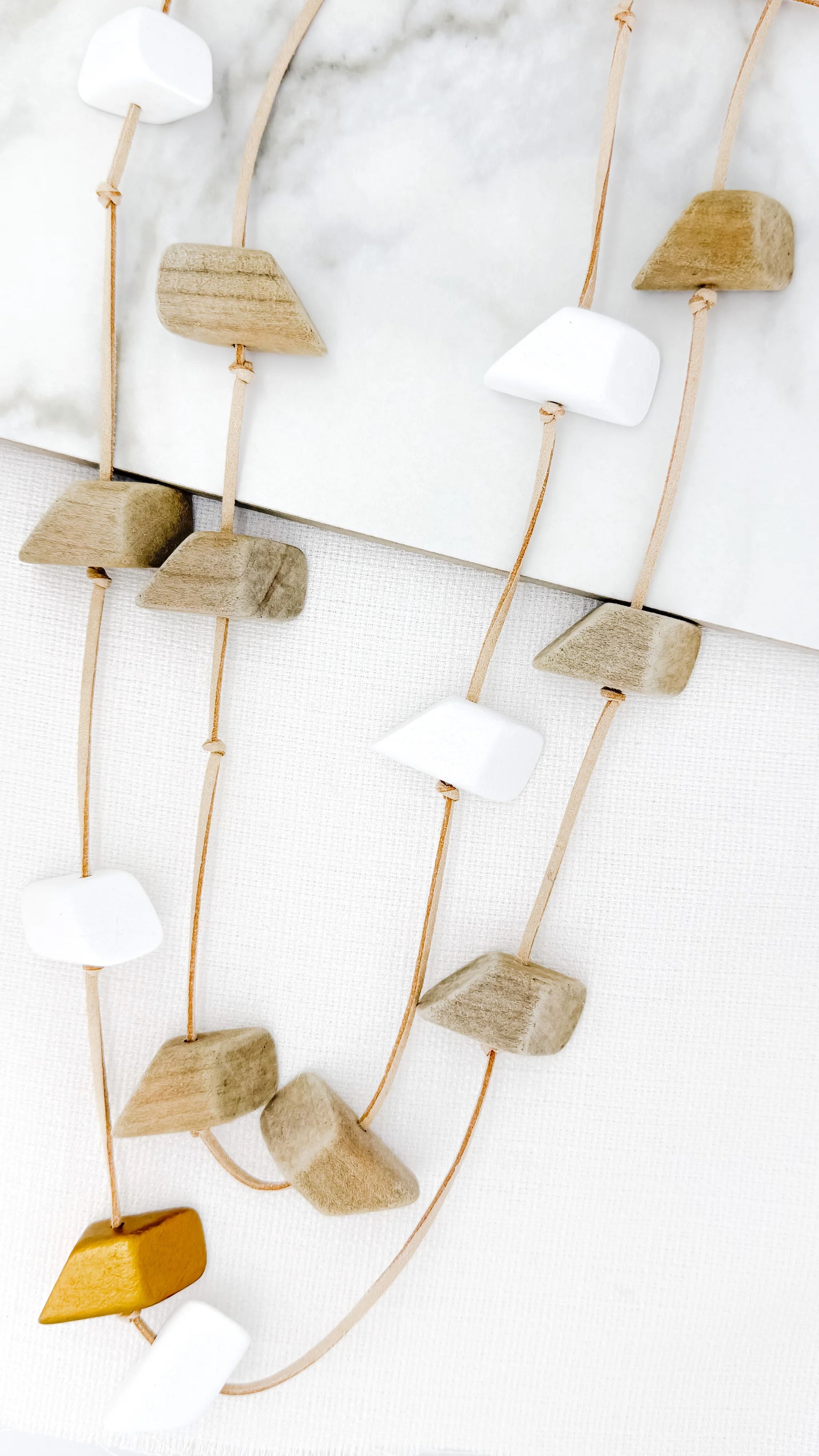 Envy Long beige double layer cord necklace with white and gold chunky beads