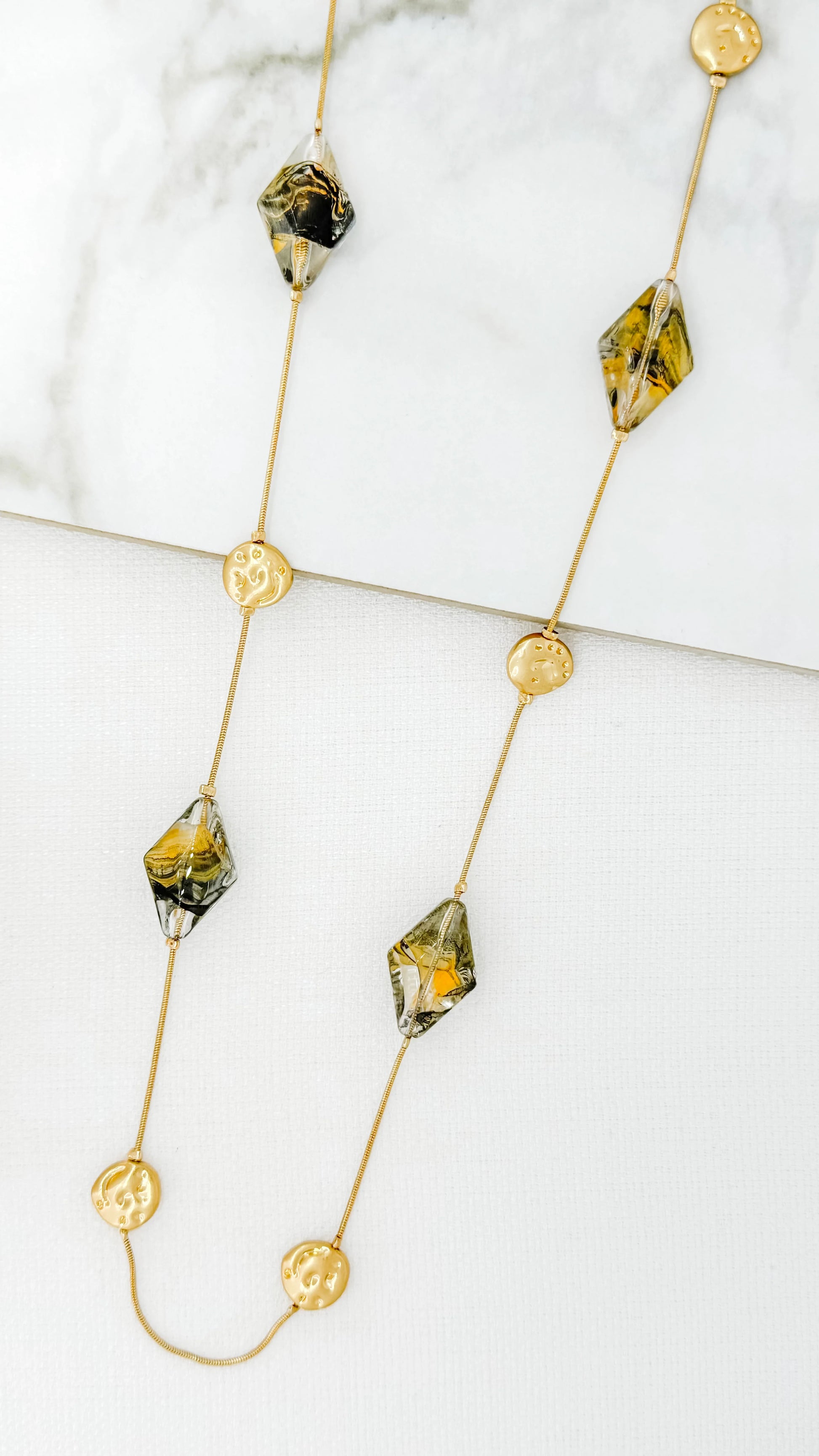 Envy Long Gold Necklace with Textured Coins and Two-Tone Resin Details