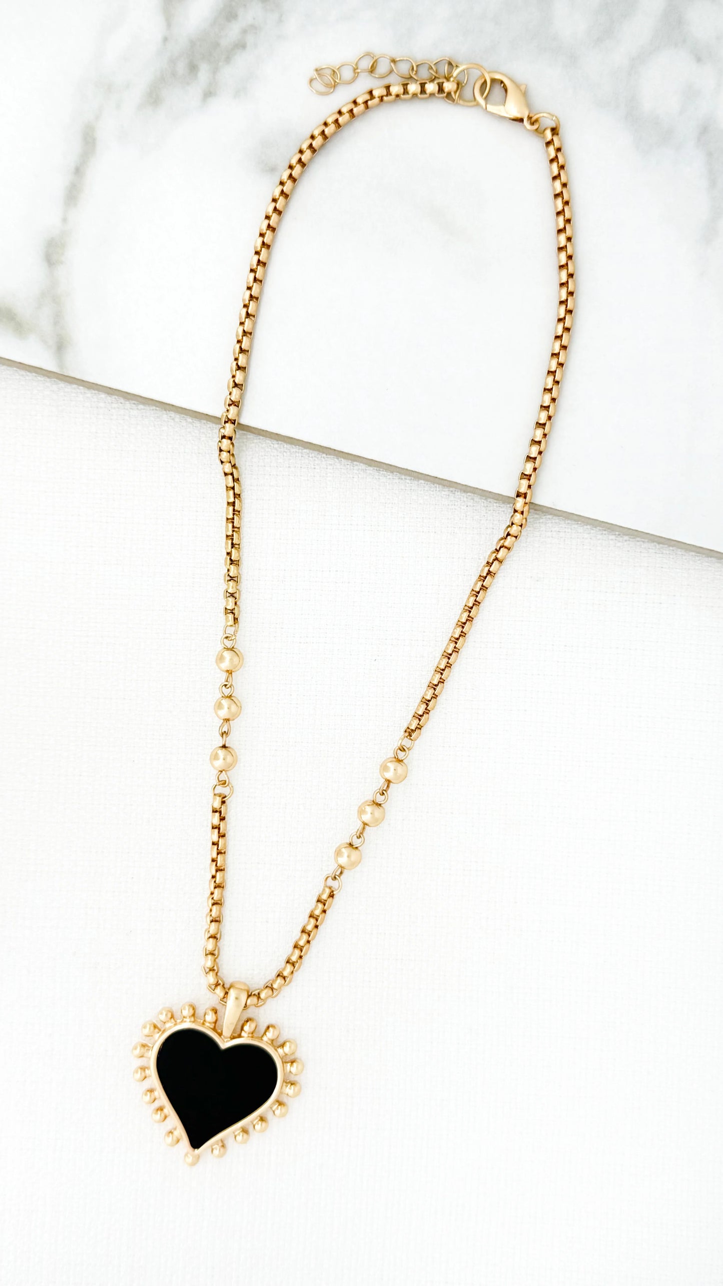 Envy Short Gold Necklace with a Black Heart Pendant