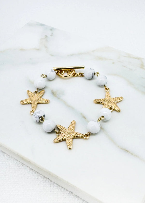 White Bead & Gold T-bar Bracelet with Starfish Design