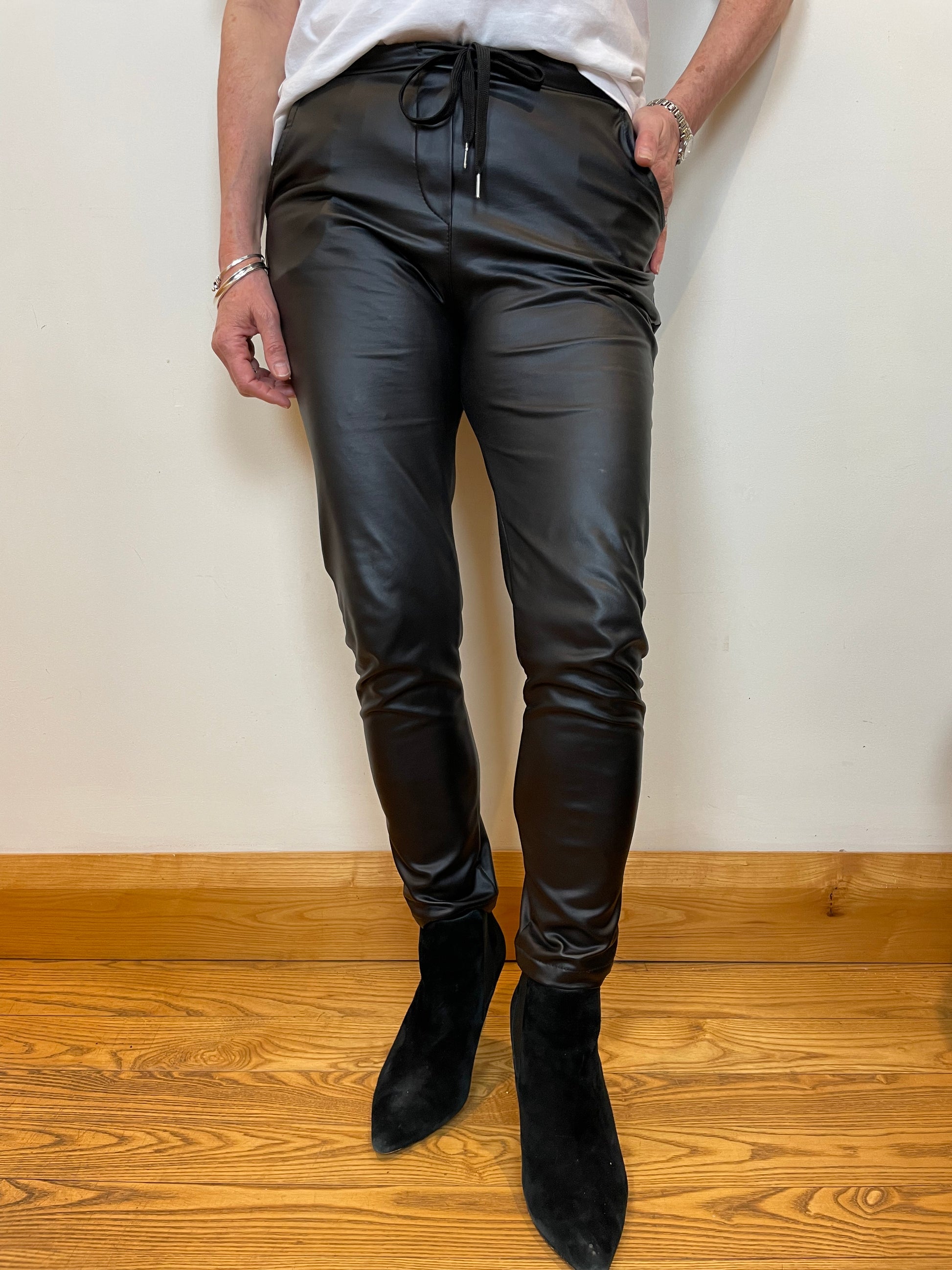 Black stretch leather look trousers