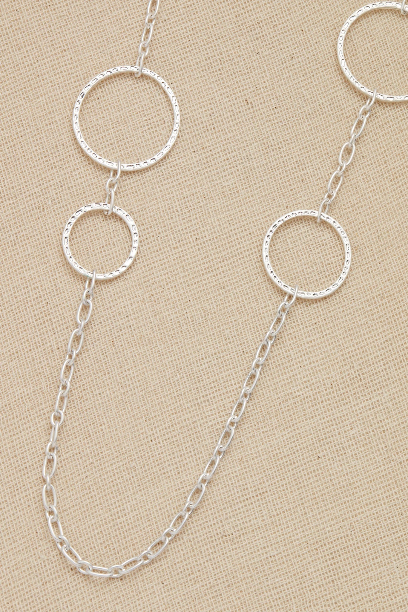 Envy long silver necklace with textured loops