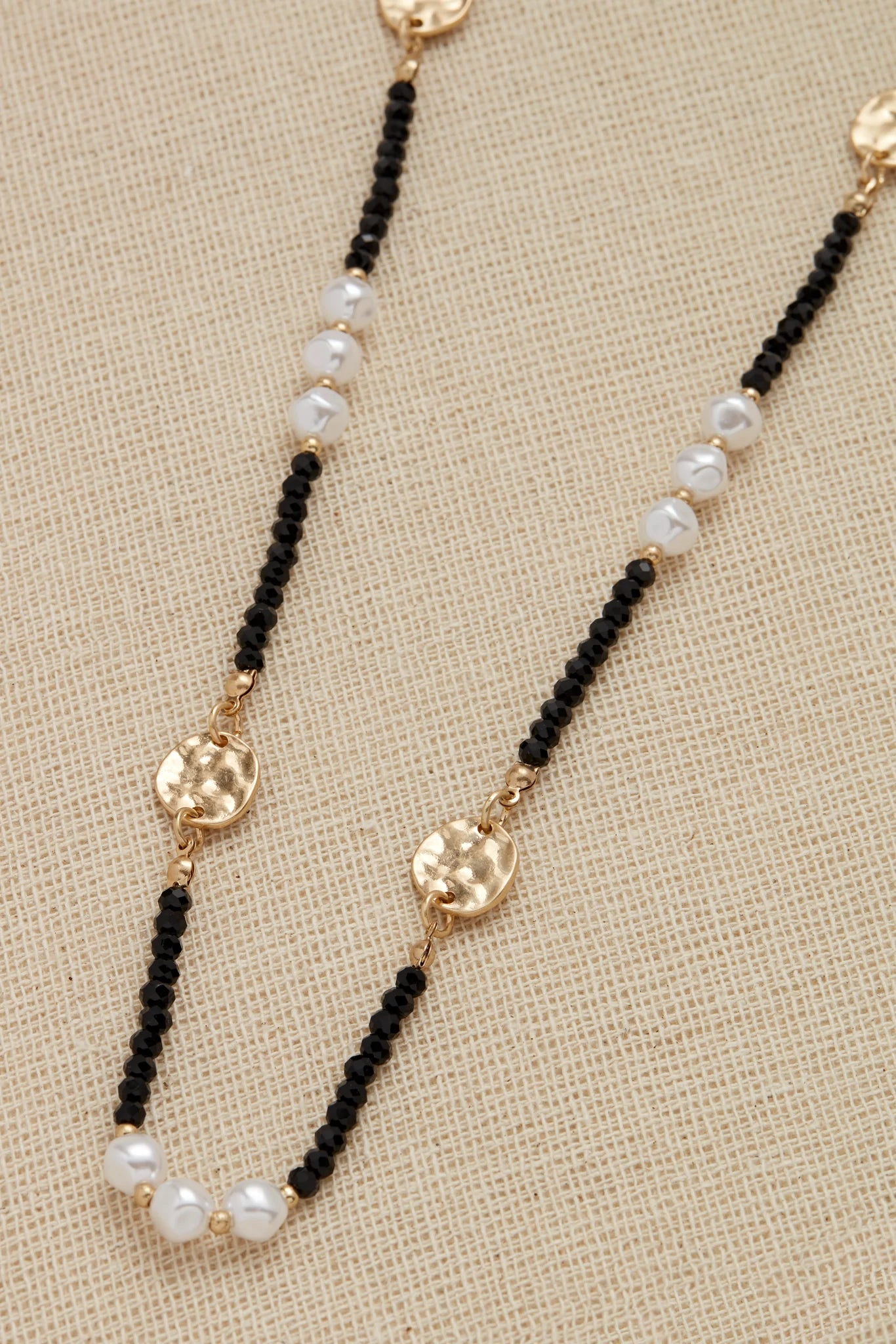 Envy long black, gold and pearl beaded necklace