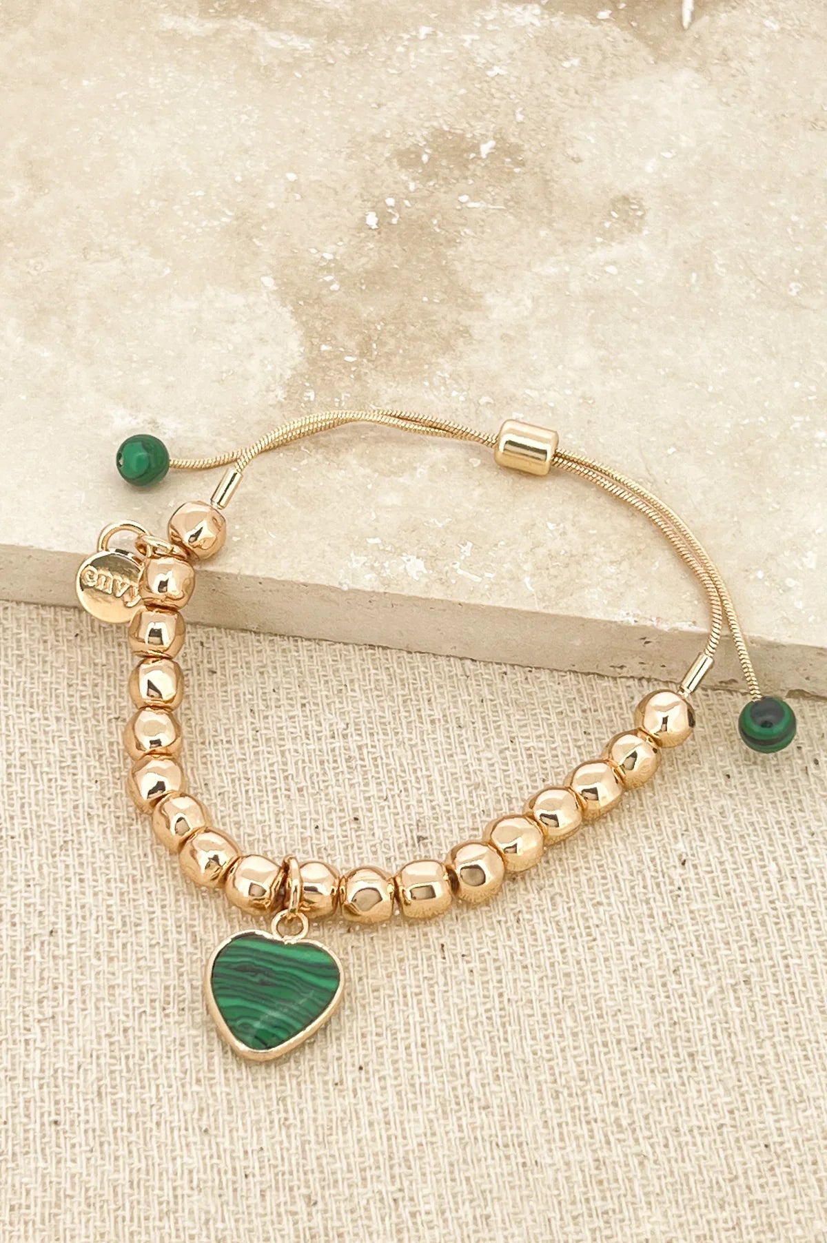 Envy Adjustable Gold Bracelet with Green Semi Precious Heart Charm